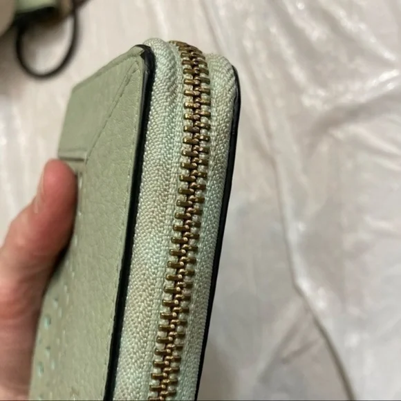 Kate spade green perforate eyelet lace leather zipper clutch wallet